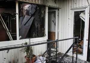 На місце розстрілу одеських кілерів щодня приносять свіжі квіти