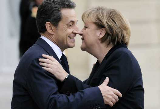 Німецький та французький лідери зустрілися на саміті присвяченому економічній кризі