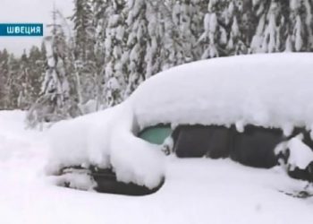 автомобиль в снежном плену